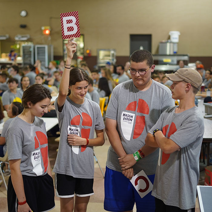 Campers compete to answer Bible trivia questions